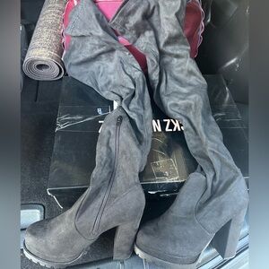 Over the knee black boots